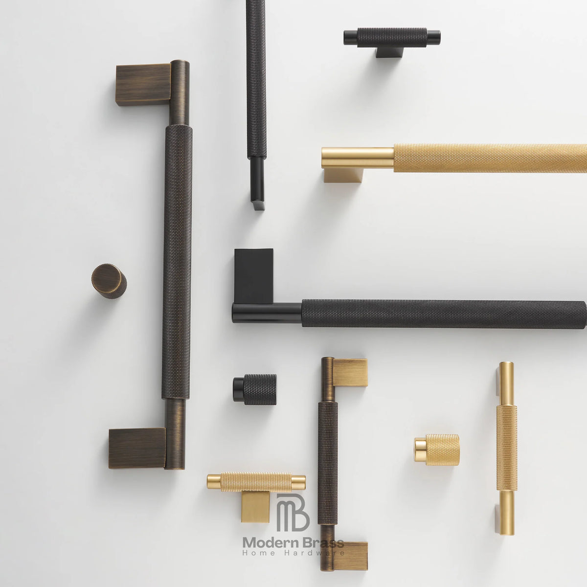 Collection of modern door handles in various designs and finishes on a white background.