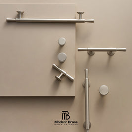 Collection of modern bathroom fixtures on a beige background with 'Modern Brass' branding.