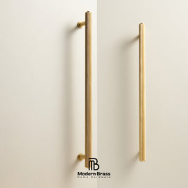 Four-piece brass cabinet hardware set including two long vertical bar handles, one short vertical bar handle, one horizontal pull handle, and three round cabinet knobs, displayed on a white surface against a beige background. The Modern Brass logo is visible at the bottom.