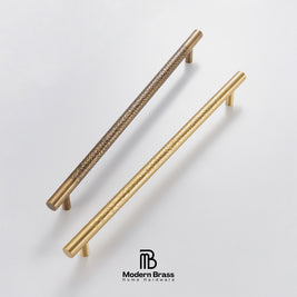 Two brass cabinet handles, one with a textured basketweave pattern and one with a twisted rope texture, displayed on a clean white background with the Modern Brass logo at the bottom.
