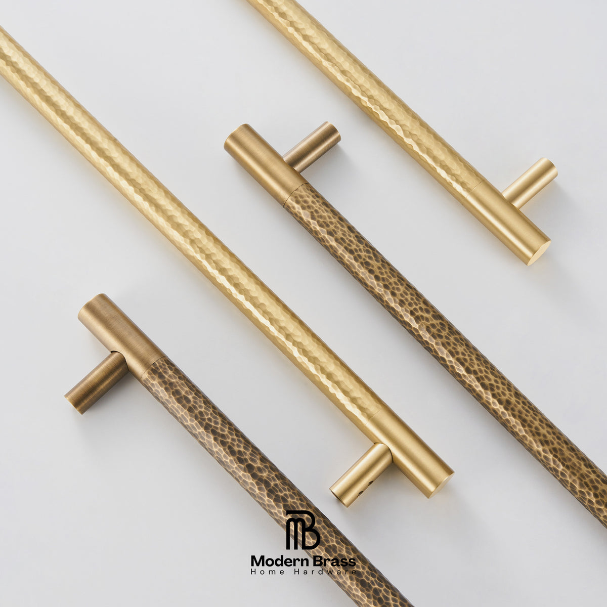Set of gold and bronze cabinet handles on a light gray background with 'Modern Brass' branding.