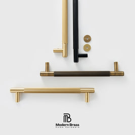 Set of gold and black cabinet handles on a white background with 'Modern Brass' branding.