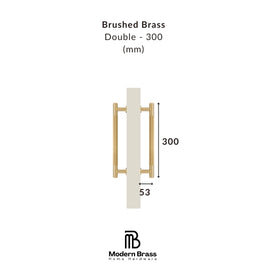 Technical product diagram of a brushed brass double door handle with dimensions labeled 300 mm height and 53 mm width, on a white background with Modern Brass branding.