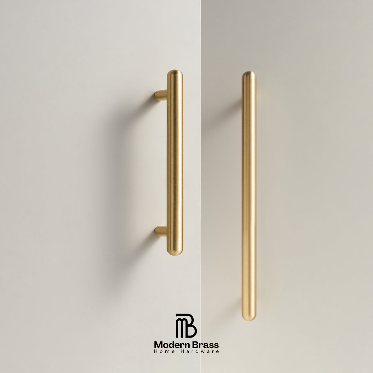 Two slim vertical brass cabinet handles mounted on a light beige wall, with a Modern Brass logo at the bottom.