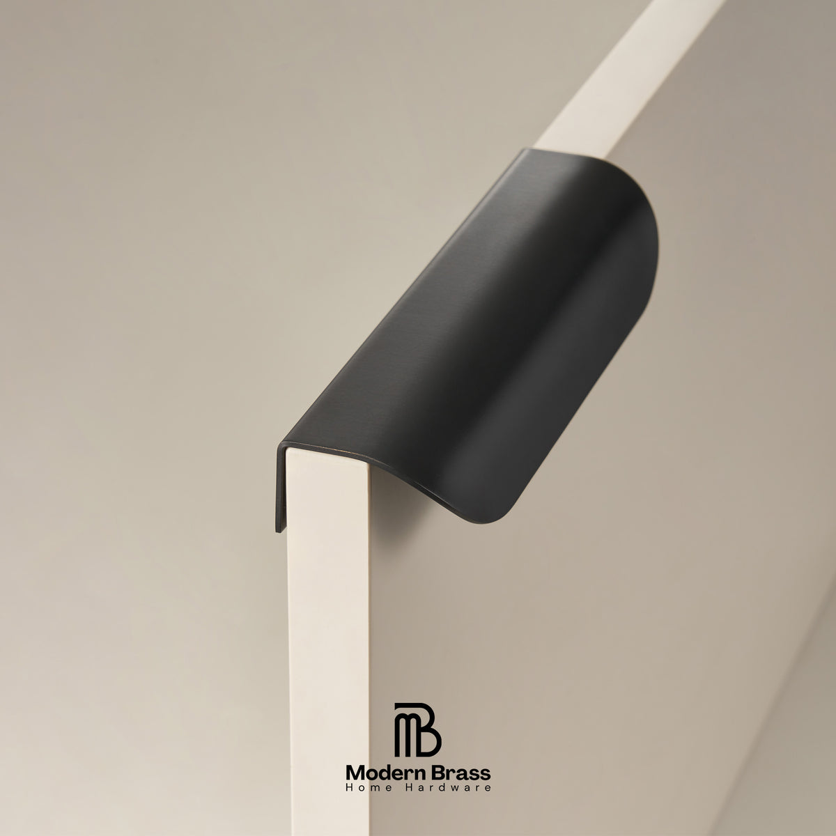 Heavyweight matte black furniture handle for minimalist dresser upcycling.