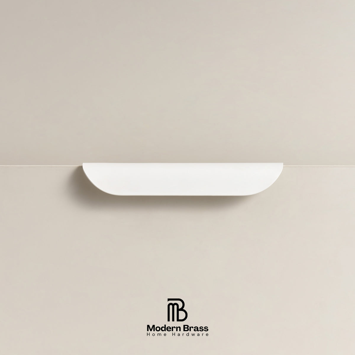 Architectural white crescent drawer handle with a smooth matte-satin finish.