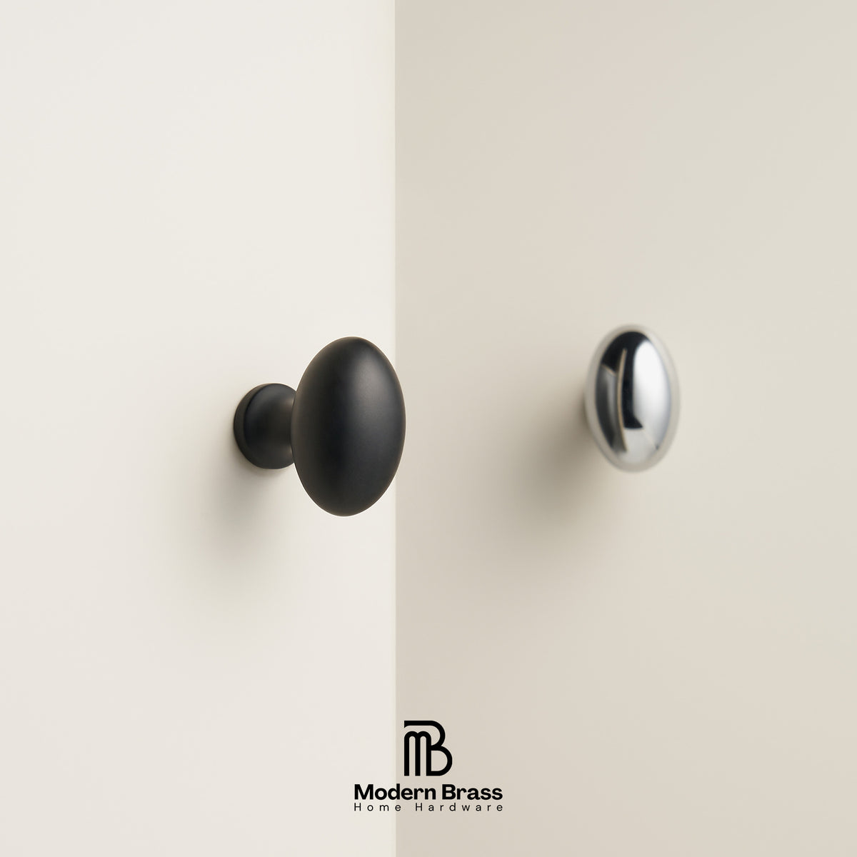 Two round cabinet knobs shown on a clean off-white wall corner: one matte black and one polished silver, with the Modern Brass Home Hardware logo at the bottom.