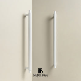 Four-piece brass cabinet hardware set including two long vertical bar handles, two shorter vertical bar handles, and three round knobs, displayed on a white surface against a beige background. The Modern Brass logo is visible at the bottom.