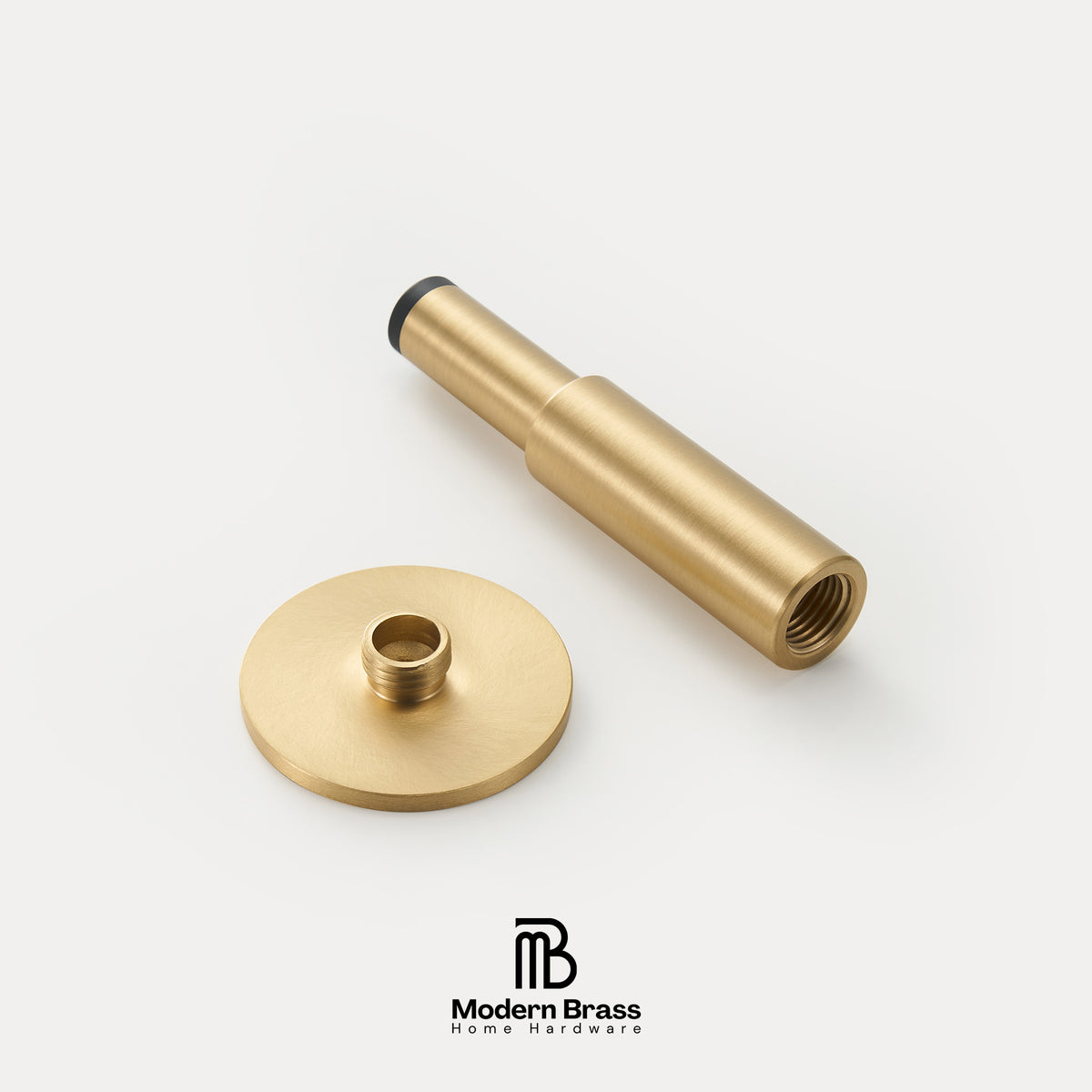 A brass faucet or pipe fitting component shown disassembled with its round flat base and cylindrical threaded body on a clean white background, with the Modern Brass logo at the bottom.
