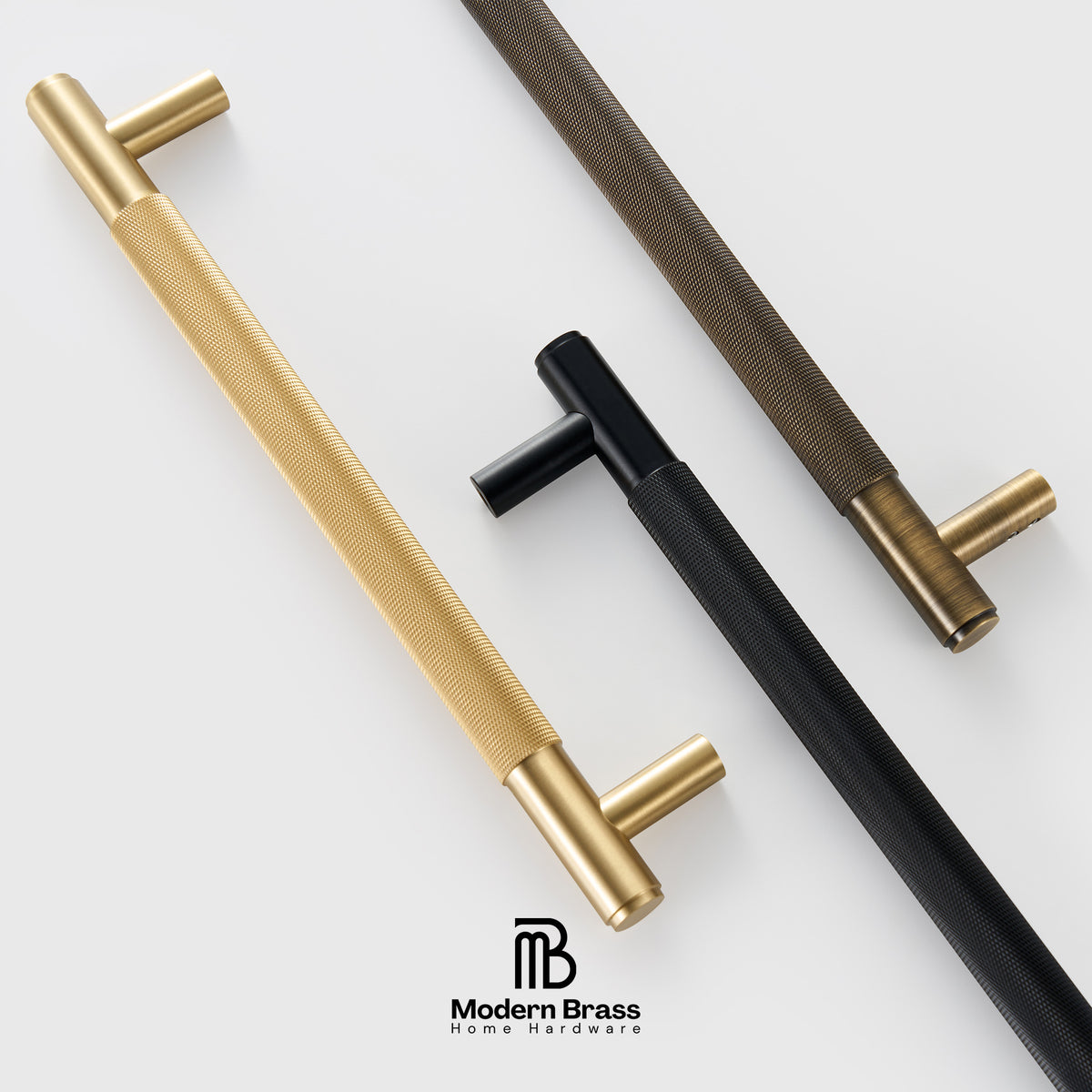 Gold cabinet handles with textured finish on a light gray background, featuring the Modern Brass logo.