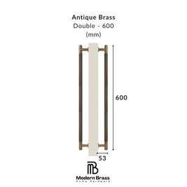 A product dimension diagram of an antique brass double door handle with dark gray grips, showing a height of 600 mm and a width of 55 mm, with the Modern Brass Home Hardware logo at the bottom.