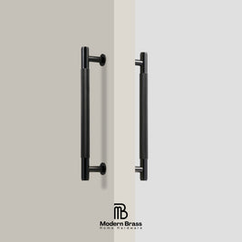 Black door handles on a neutral background with 'Modern Brass' branding.